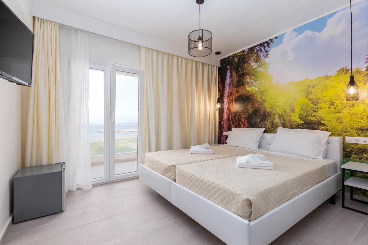 Aqua Luxury Suites By Estia Рода Екстериор снимка