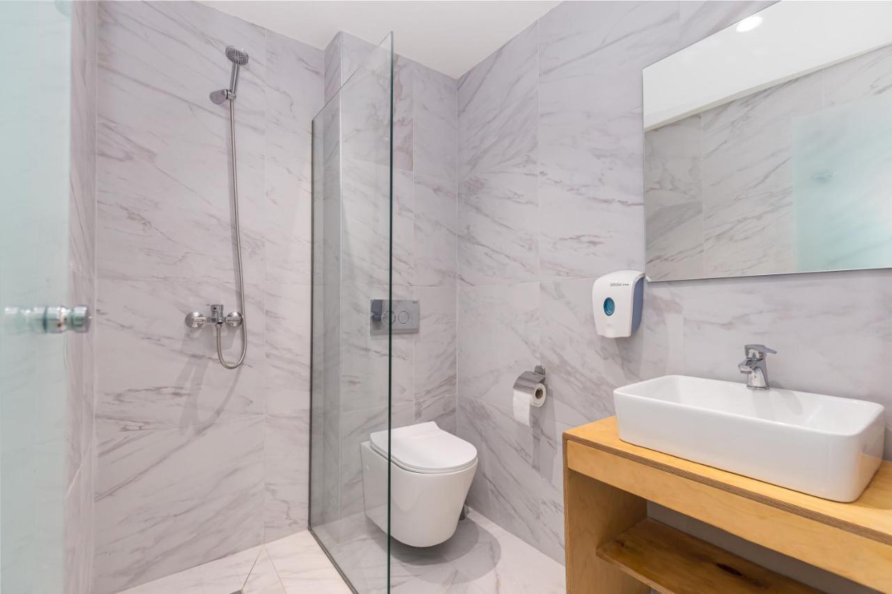 Aqua Luxury Suites By Estia Рода Екстериор снимка