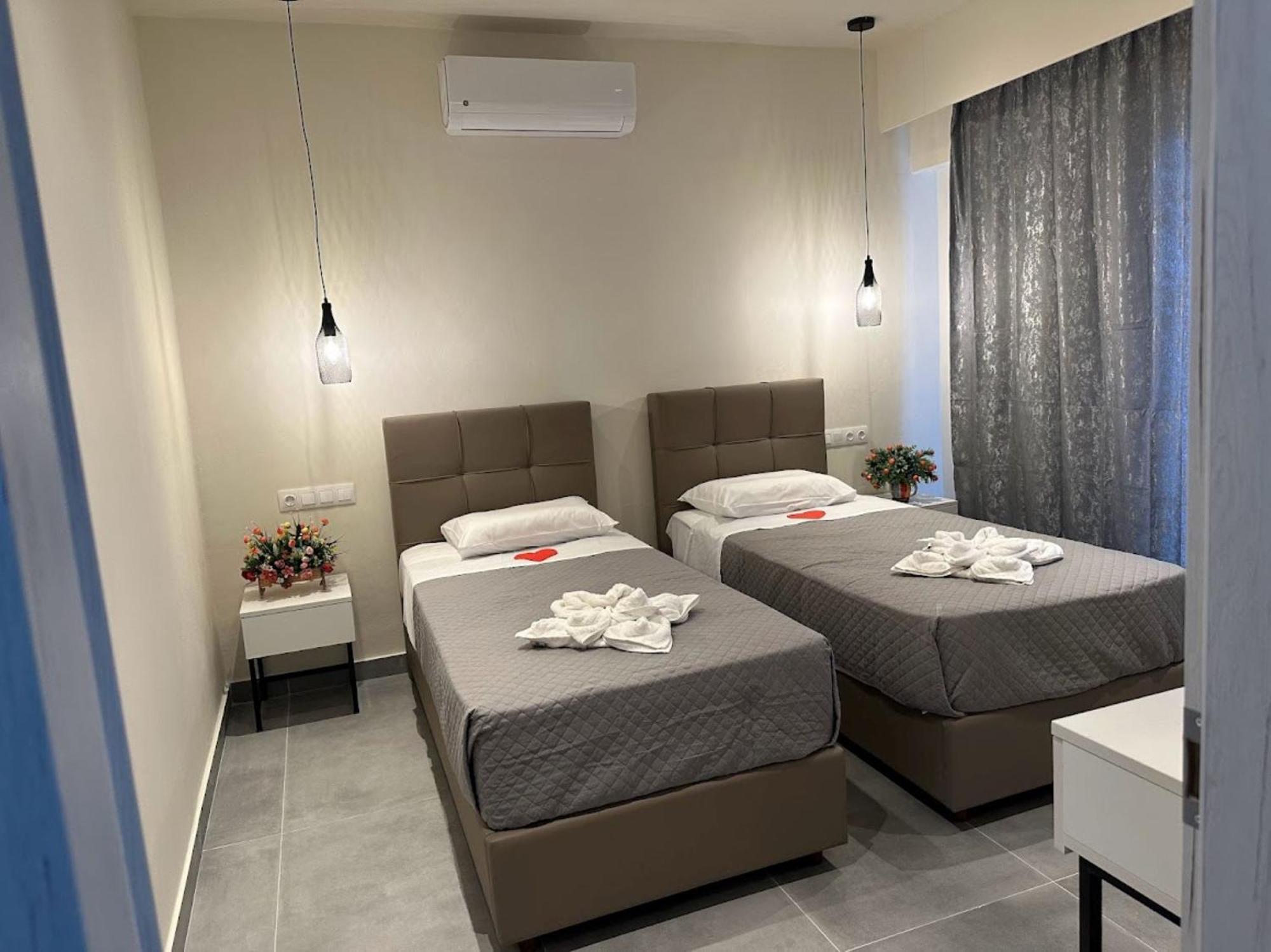 Aqua Luxury Suites By Estia Рода Екстериор снимка